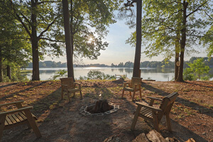 seating area around a bayside firepit at Vaux Hall Farm