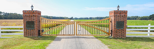 A view of the Vaux Hall Farm entrance gate, closed